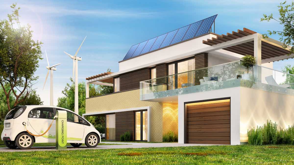 Casa con paneles solares y cargador de vehiculo electrico Casa con paneles solares y cargador de vehículo eléctrico